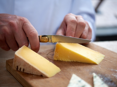 ￼Hands-cutting-Cheese￼-3008