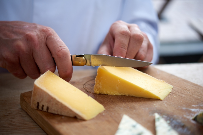 ￼Hands-cutting-Cheese￼-3008