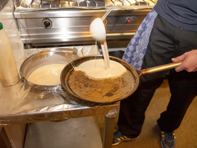 Hands Making Pancakes